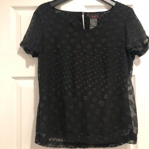 Black polka dot shirt